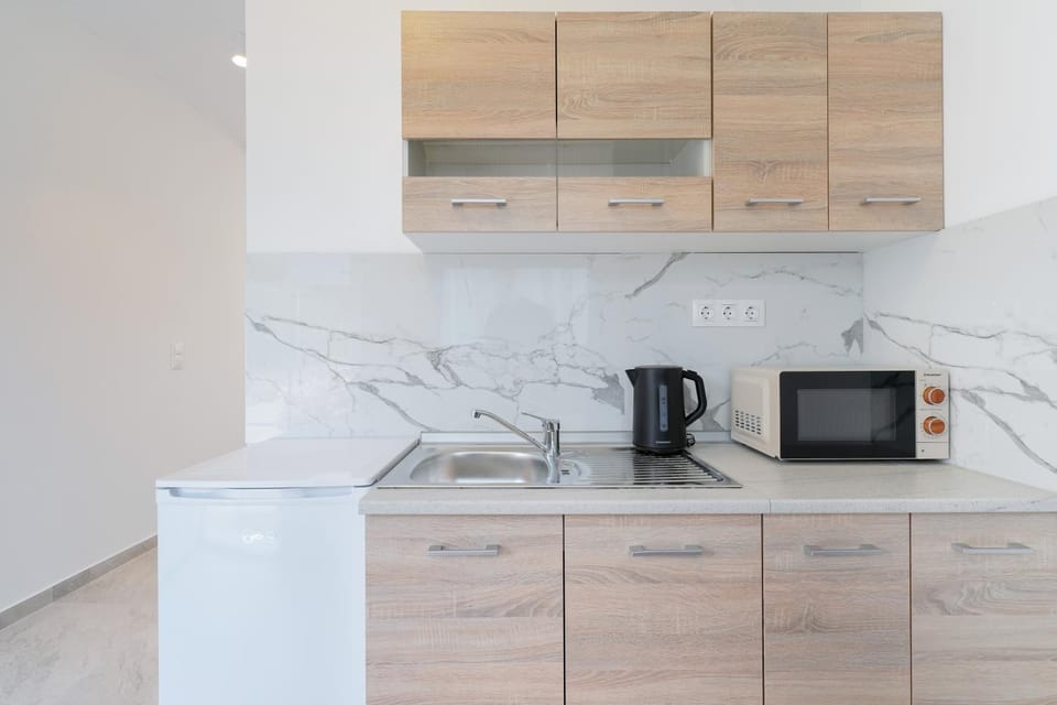 Kitchen or kitchenette, microwave