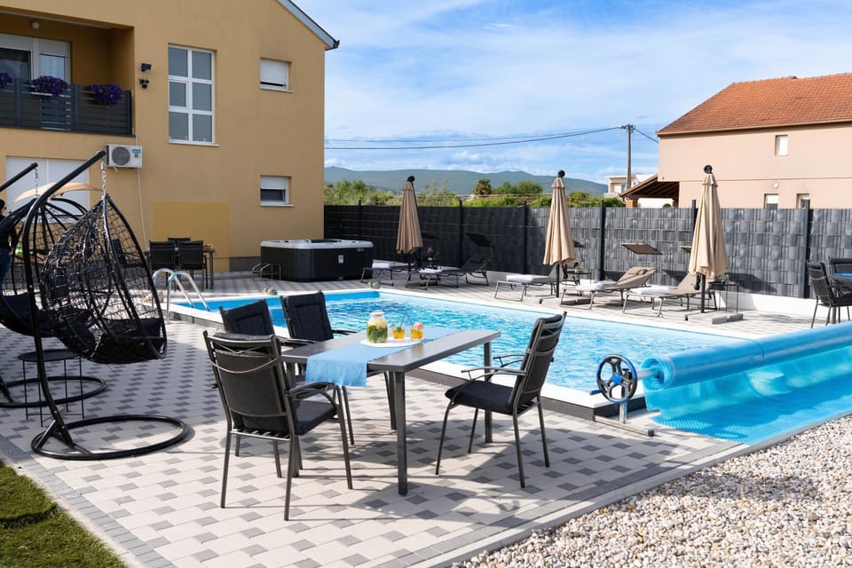 Property building, Pool view, Swimming pool, sunbed