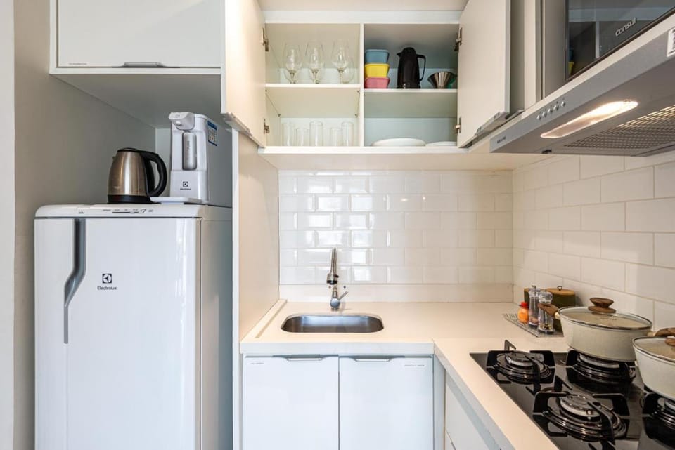 Kitchen or kitchenette, microwave, stove, toaster