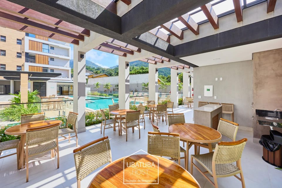 Property building, Patio, Day, BBQ facilities, View (from property/room), Balcony/Terrace, Seating area, Dining area, Pool view, Swimming pool, sunbed