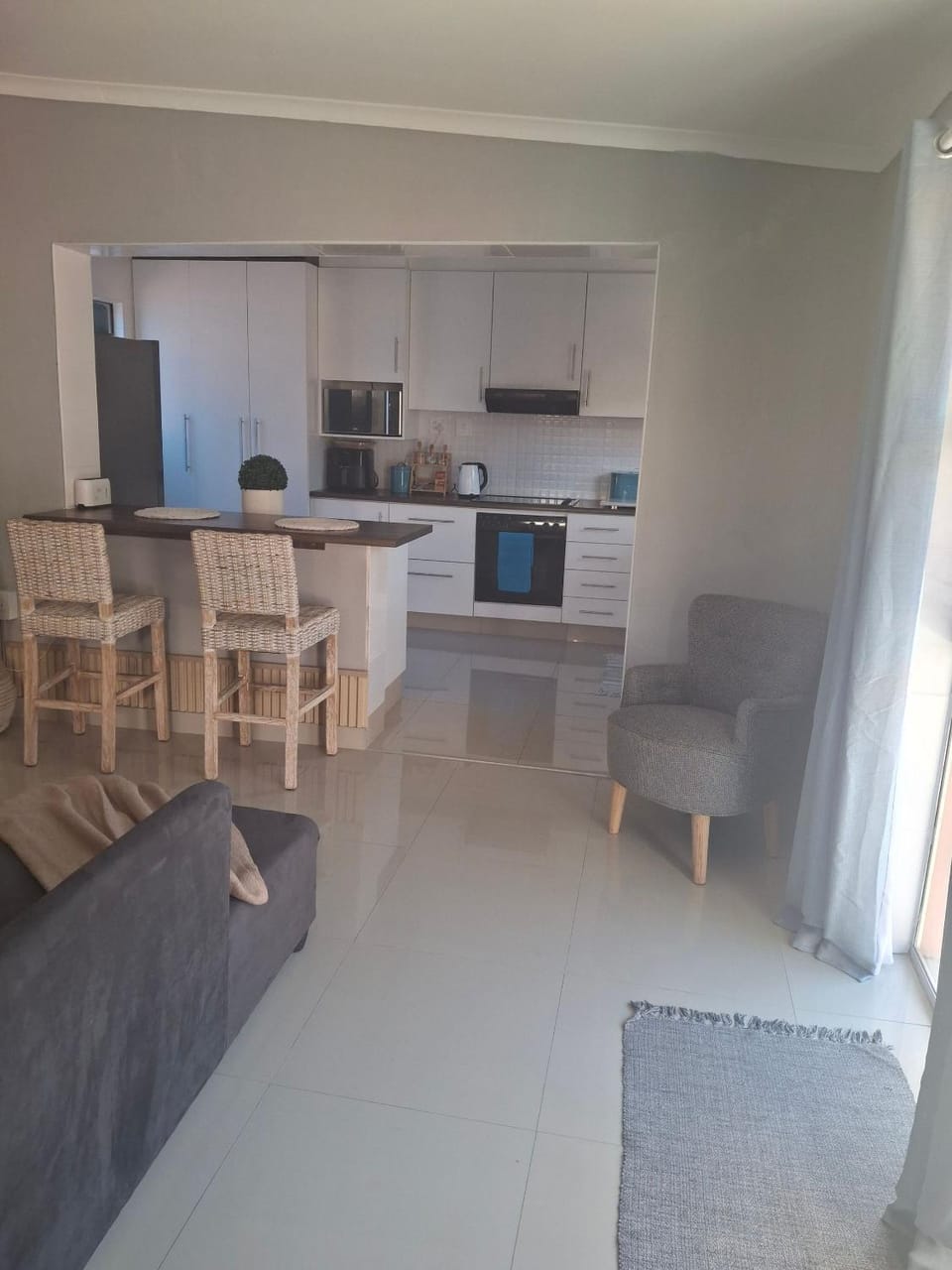 Living room, microwave, oven, kitchen