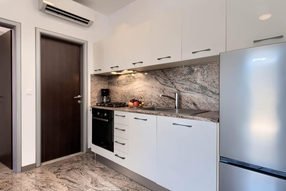 Kitchen or kitchenette, oven