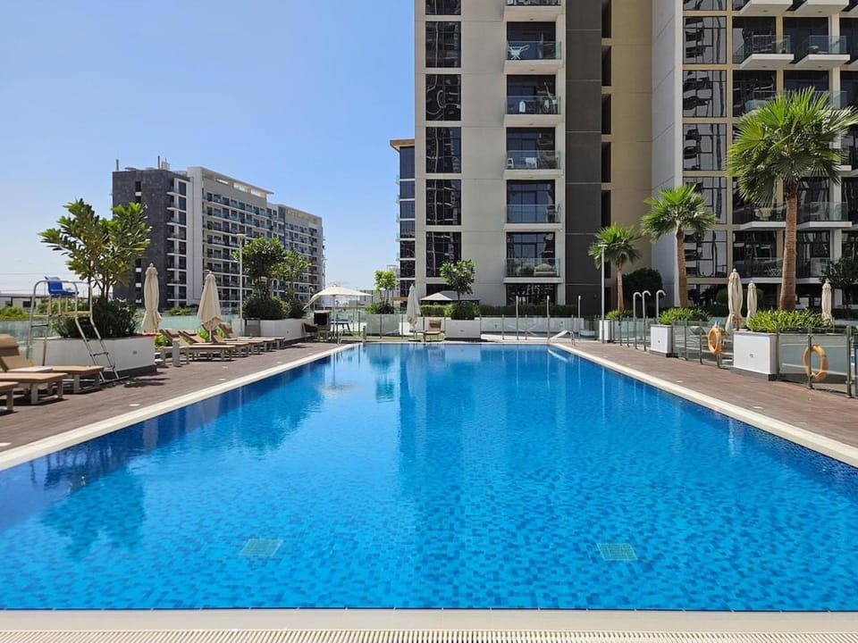 Luxury 1BR Balcony Pool View Riviera Top Floor by Maxx Value Homes Apartment in Dubai