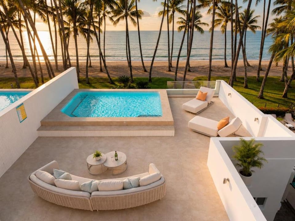 Patio, View (from property/room), Balcony/Terrace, Seating area, Beach, Landmark view, Pool view, Sea view, Swimming pool, sunbed