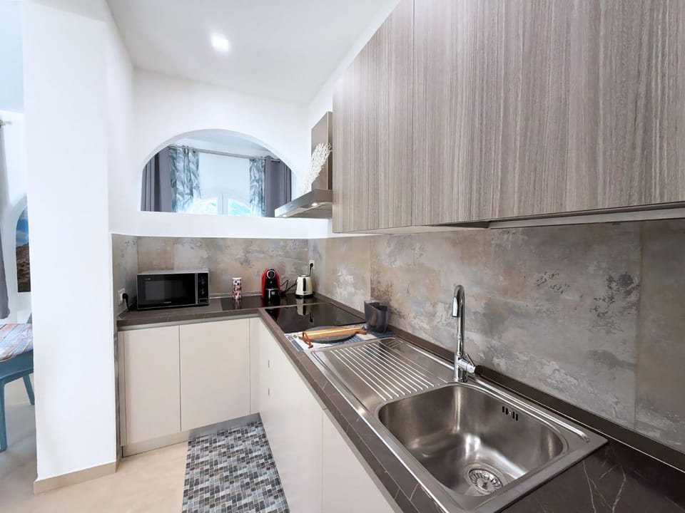 Kitchen or kitchenette, stove