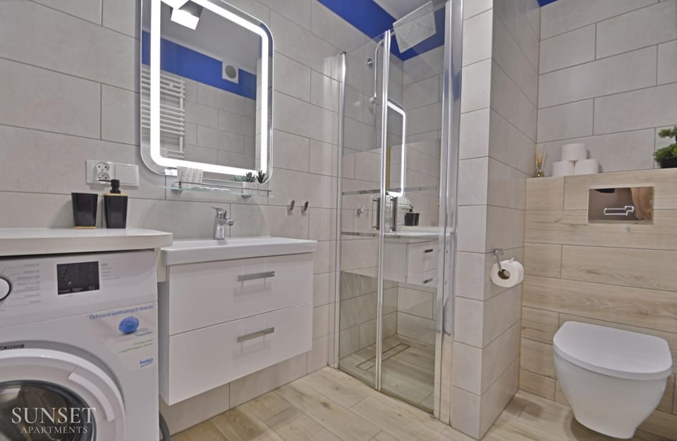 Shower, Toilet, Bathroom, towels, washing machine, dryer