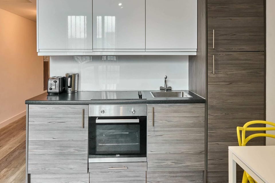 Kitchen or kitchenette, oven, stove