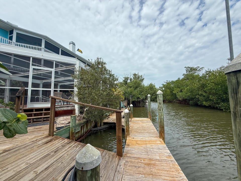 Twin Dolphins Pool, Docks, Elevator, Golf Cart House in North Captiva Island