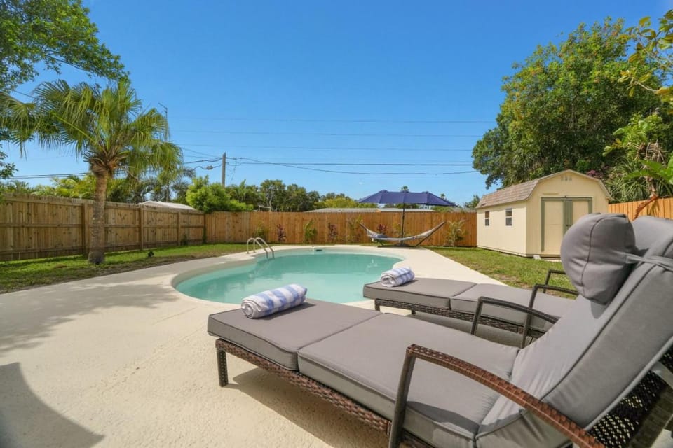 Patio, Day, Natural landscape, Pool view, Swimming pool, sunbed