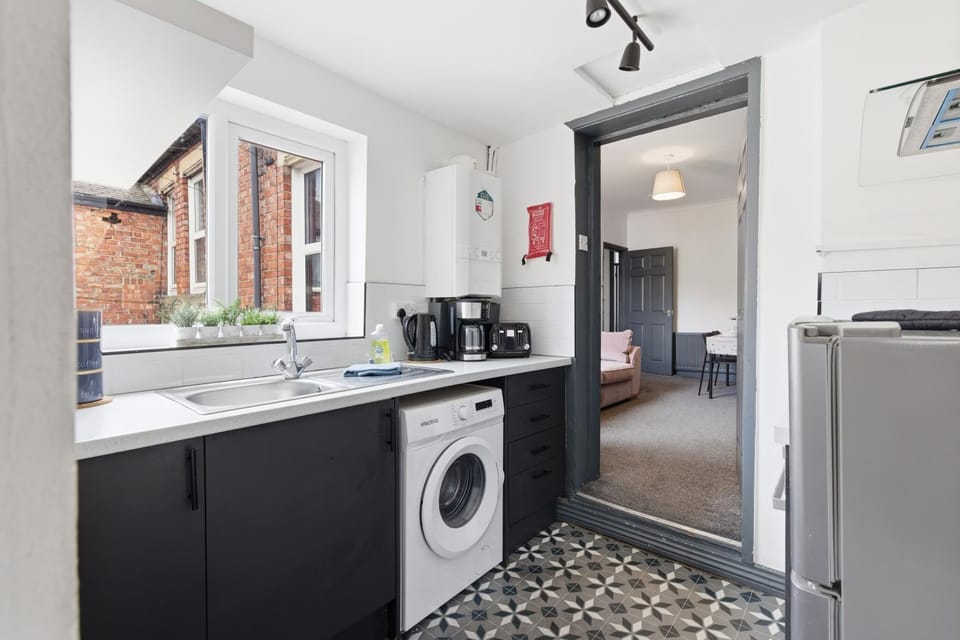 Coffee/tea facilities, washing machine, kitchen