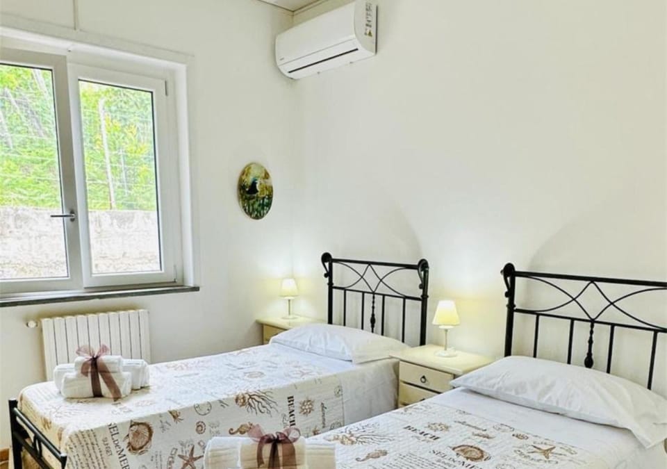Bed, Photo of the whole room, Bedroom, towels, air conditioner
