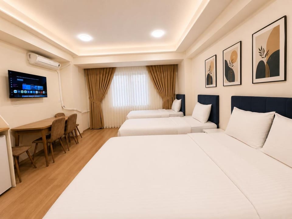 Communal lounge/ TV room, Bed, TV and multimedia, Living room, Photo of the whole room, Seating area, Evening entertainment, Bedroom, hair dresser, air conditioner