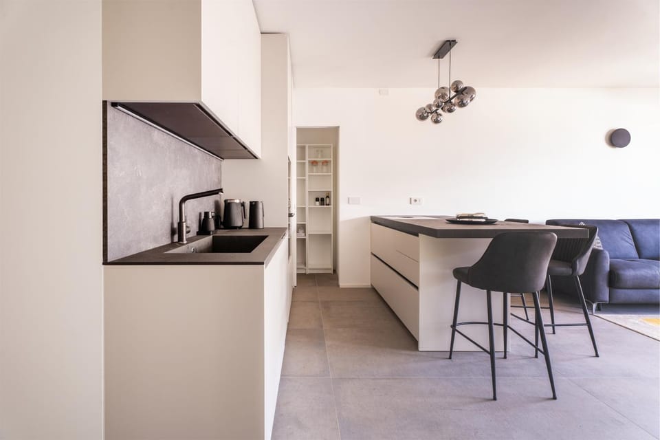 Kitchen or kitchenette, dishwasher, microwave, oven
