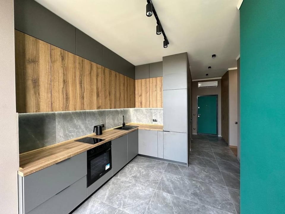 Kitchen or kitchenette, oven, stove