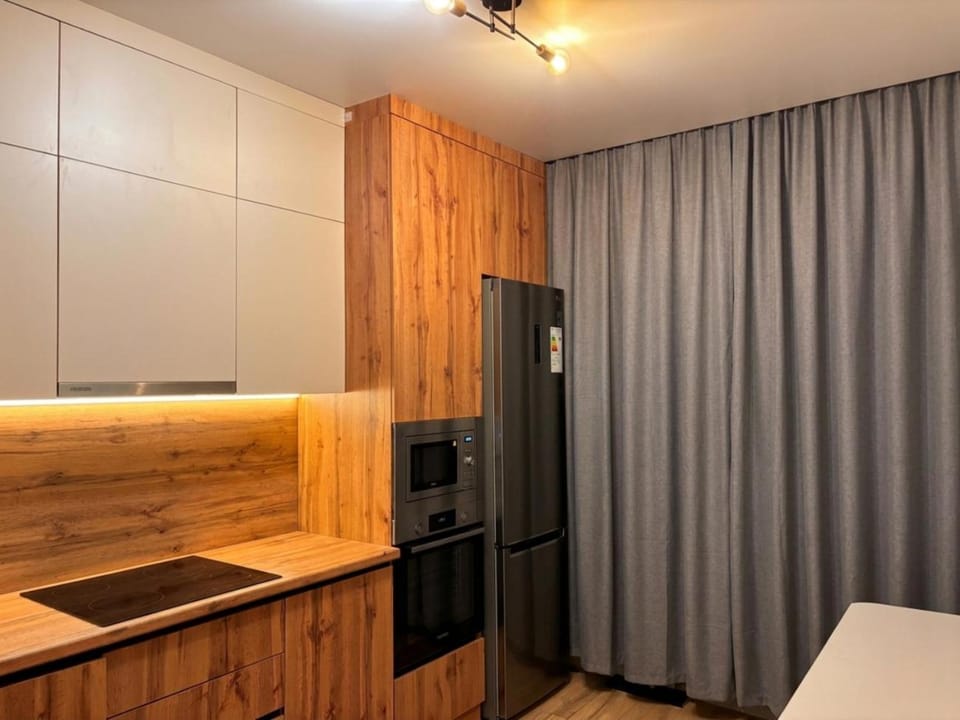 Kitchen or kitchenette, oven, stove
