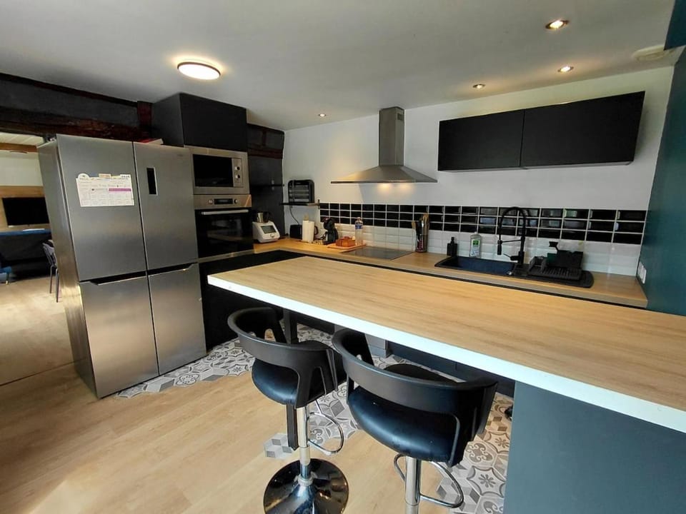 Kitchen or kitchenette, dishwasher, oven, stove, toaster