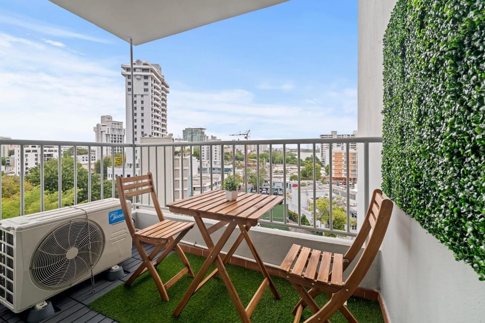 Property building, Patio, View (from property/room), Balcony/Terrace, Living room, Seating area, Dining area, air conditioner