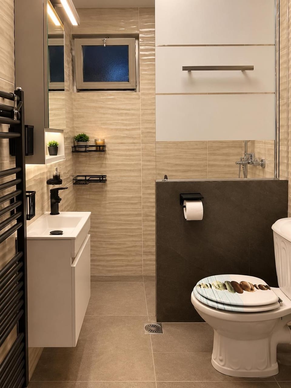 Shower, Toilet, bidet, hair dryier, towels, washing machine