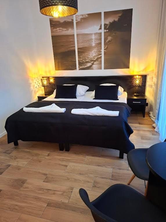 Tesao Room by Dworek Marino Apartment in West Pomeranian Voivodeship, Poland