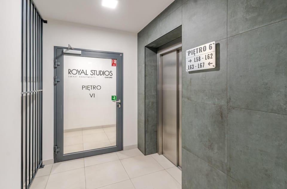 Property building, Property logo or sign, elevator