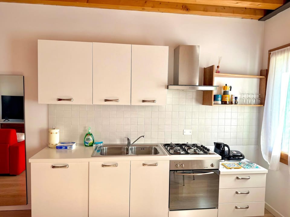 Kitchen or kitchenette, oven, stove