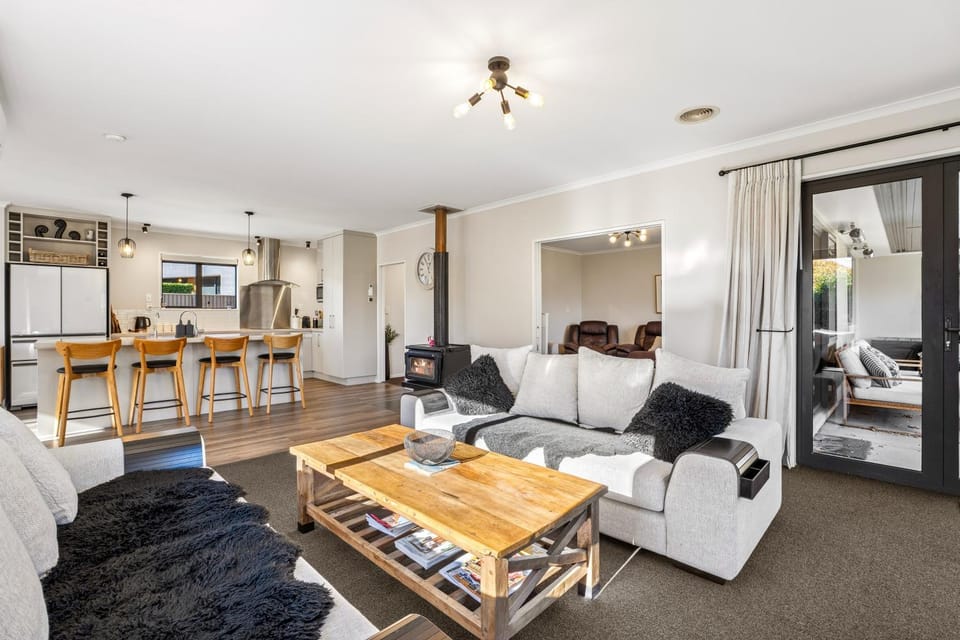 Seating area, fireplace, kitchen