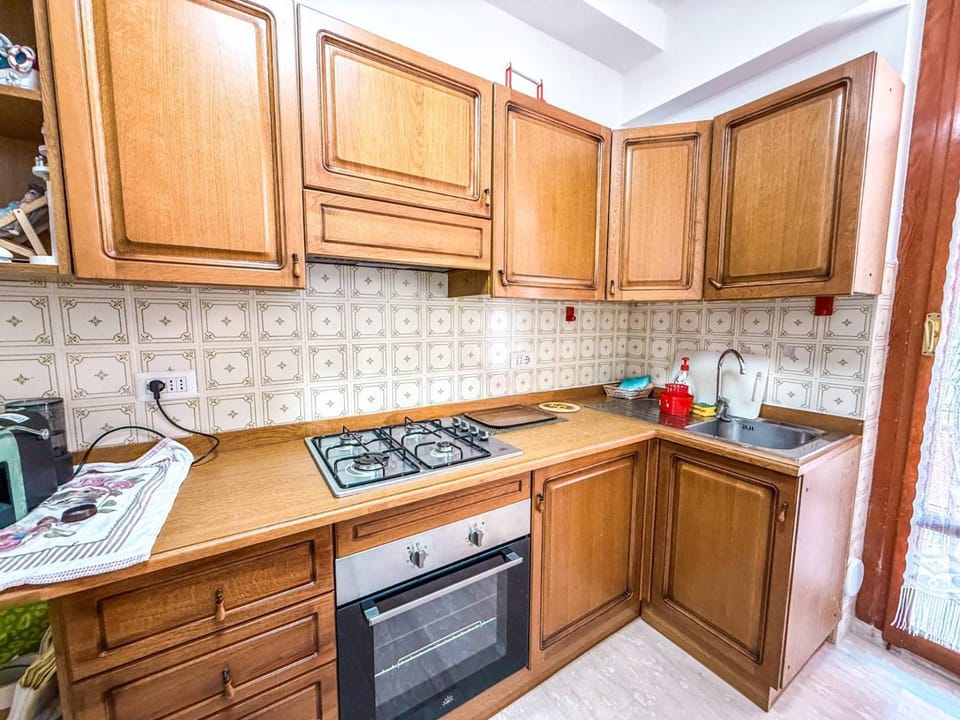 Kitchen or kitchenette, stove