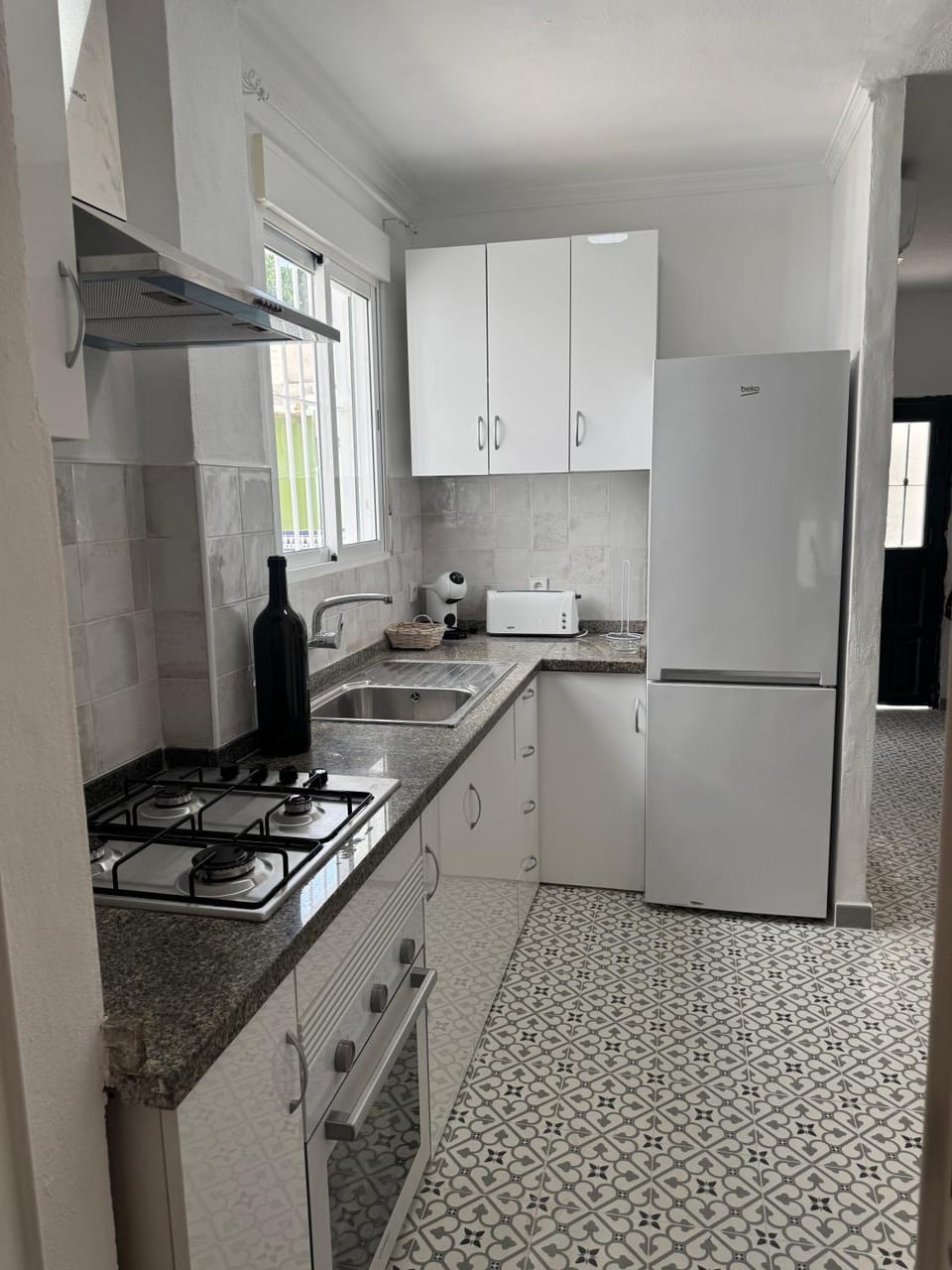 Kitchen or kitchenette, oven, toaster
