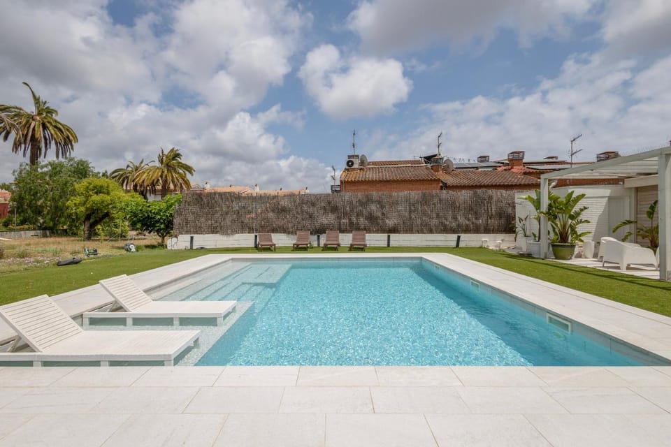 Property building, Living room, Swimming pool