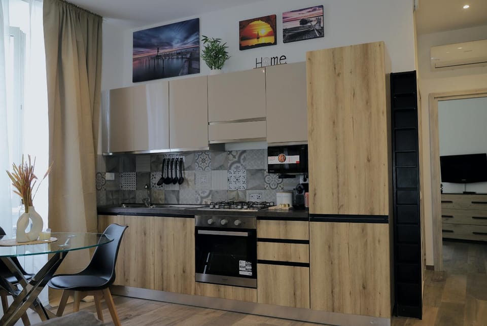 Kitchen or kitchenette, oven, stove, toaster