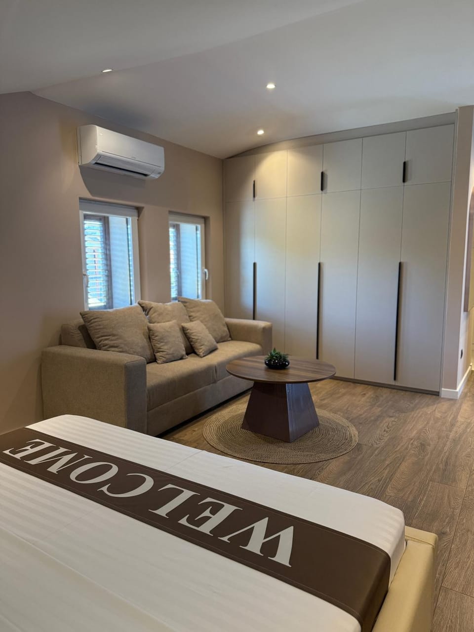 Seating area, Bedroom, minibar, safe, wardrobe, air conditioner