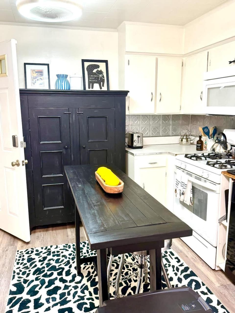 Kitchen or kitchenette, dishwasher, oven, stove, washing machine, dryer