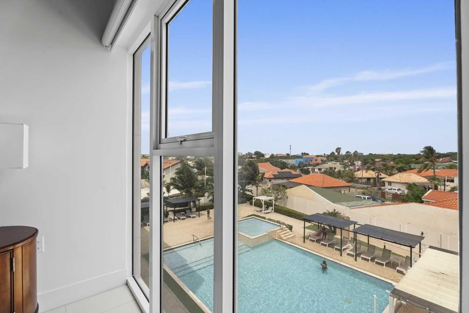 AL313 -Resort Pool-Beach Tennis court- 2BR condo-Close to Palm Beach House in Noord