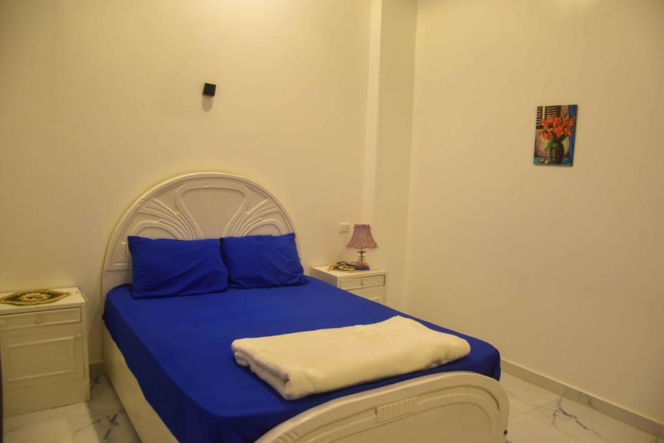 Bed, Bedroom, flat iron, towels, wardrobe, air conditioner