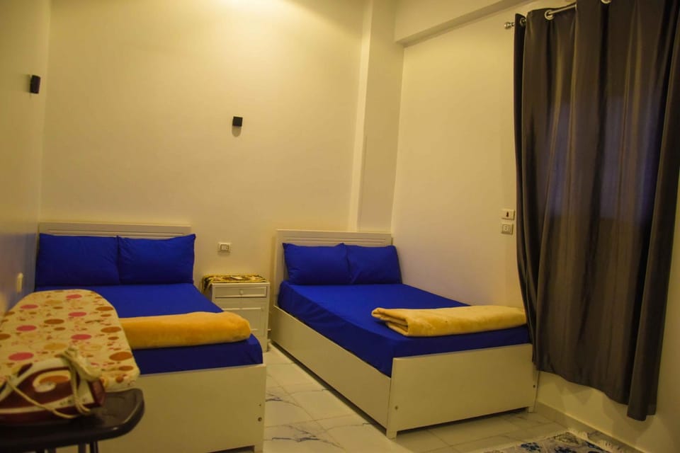 Bed, Bedroom, flat iron, towels, wardrobe, air conditioner