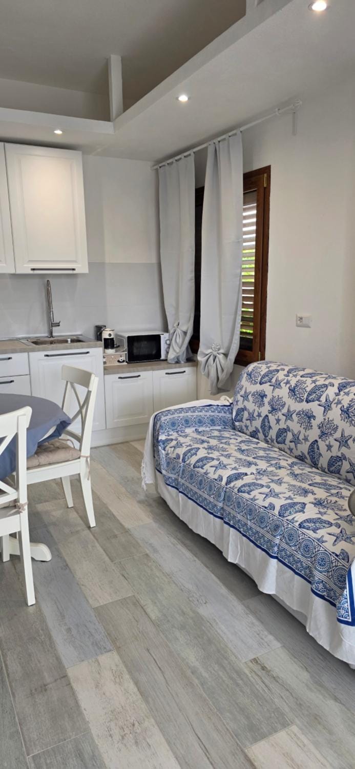 Q Home San Teodoro Centro Apartment in San Teodoro