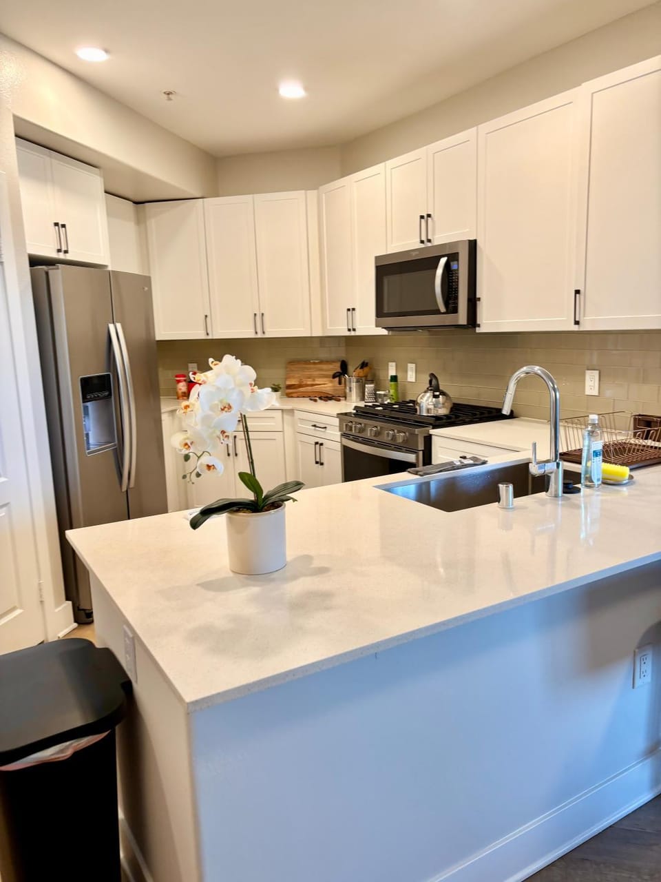 Kitchen or kitchenette, dishwasher, oven, stove, toaster