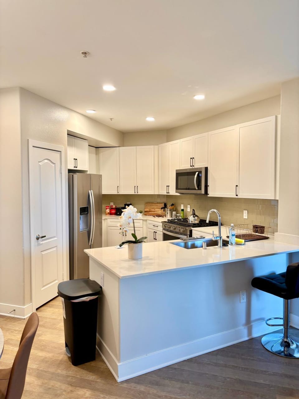 Kitchen or kitchenette, dishwasher, oven, stove, toaster