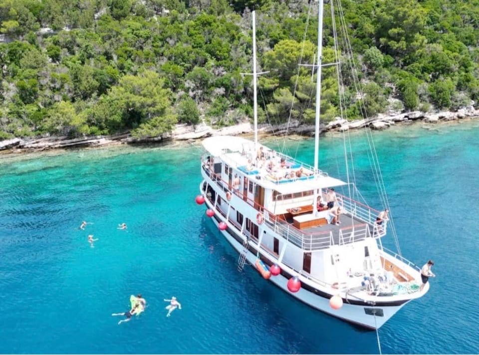 Party boat excursion to Hvar town vith overnight, breakfast and lunch Docked boat in Split