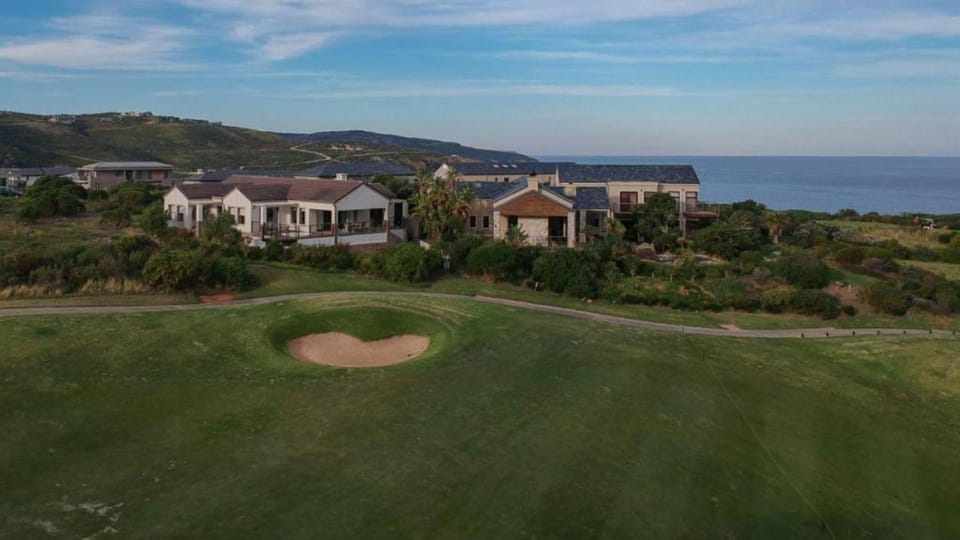 Property building, Natural landscape, Bird's eye view, Golfcourse, Golfcourse