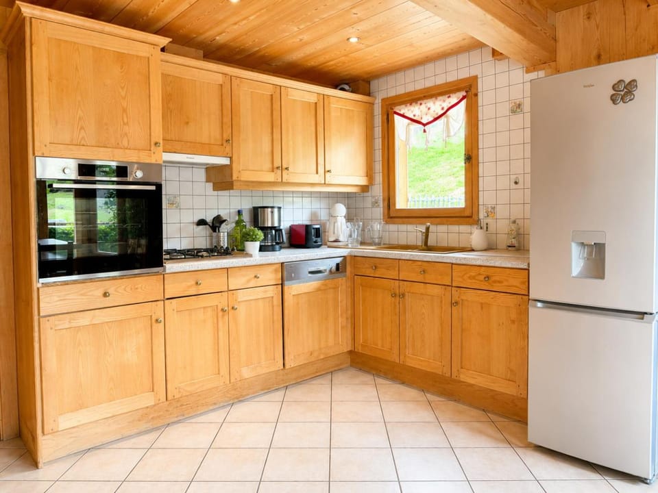 Kitchen or kitchenette, dishwasher, oven, stove, toaster
