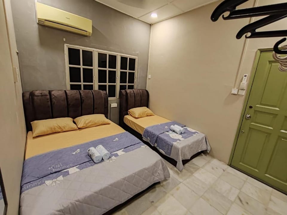 Bed, Bedroom, hair dryier, towels, air conditioner