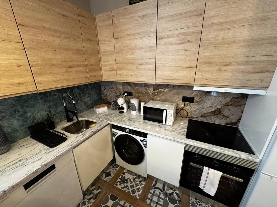 dishwasher, microwave, oven, stove, washing machine, dryer, kitchen