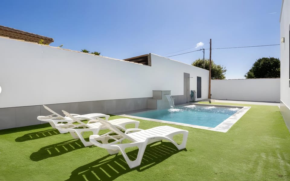 Property building, Living room, Swimming pool