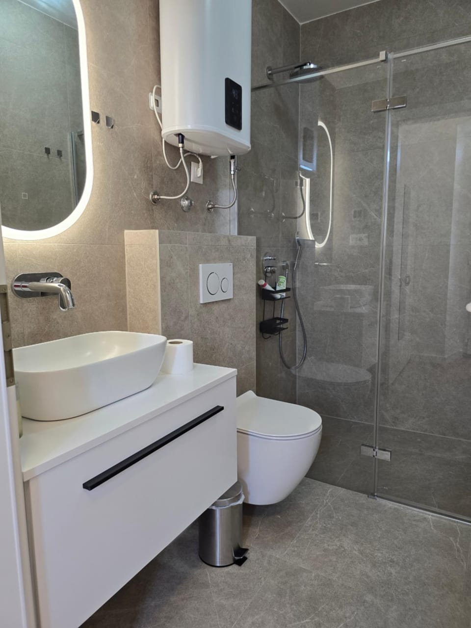 Shower, Toilet, Bathroom, hair dryier, towels