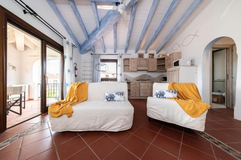 Private beaches and patio with a view, Cala del Faro Apartment in Sardinia