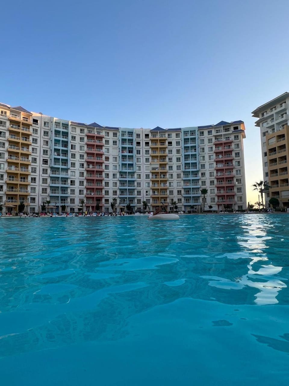 Property building, Day, Natural landscape, City view, Pool view, Swimming pool