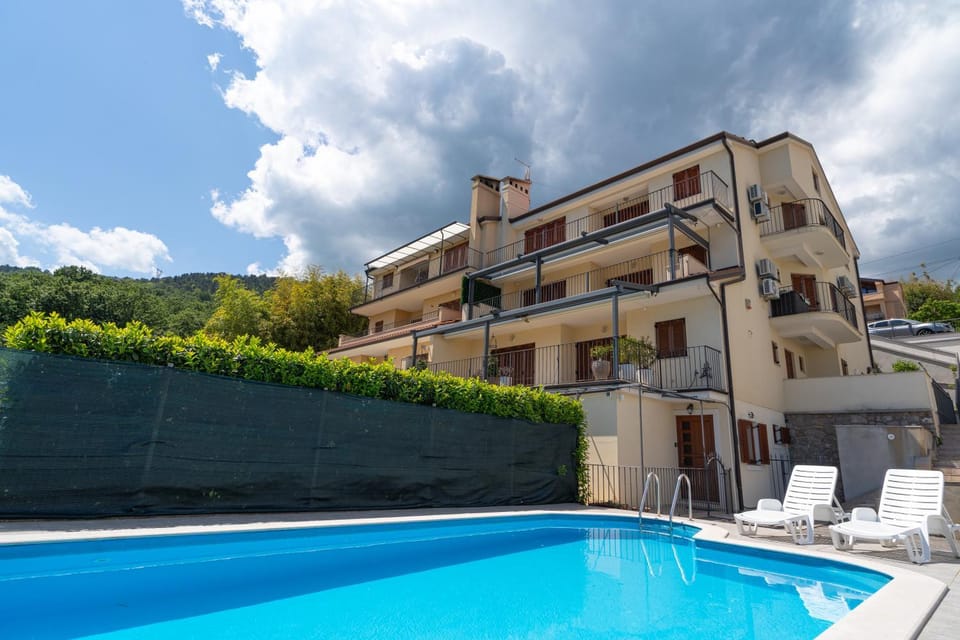 Property building, Day, Pool view, Swimming pool, sunbed