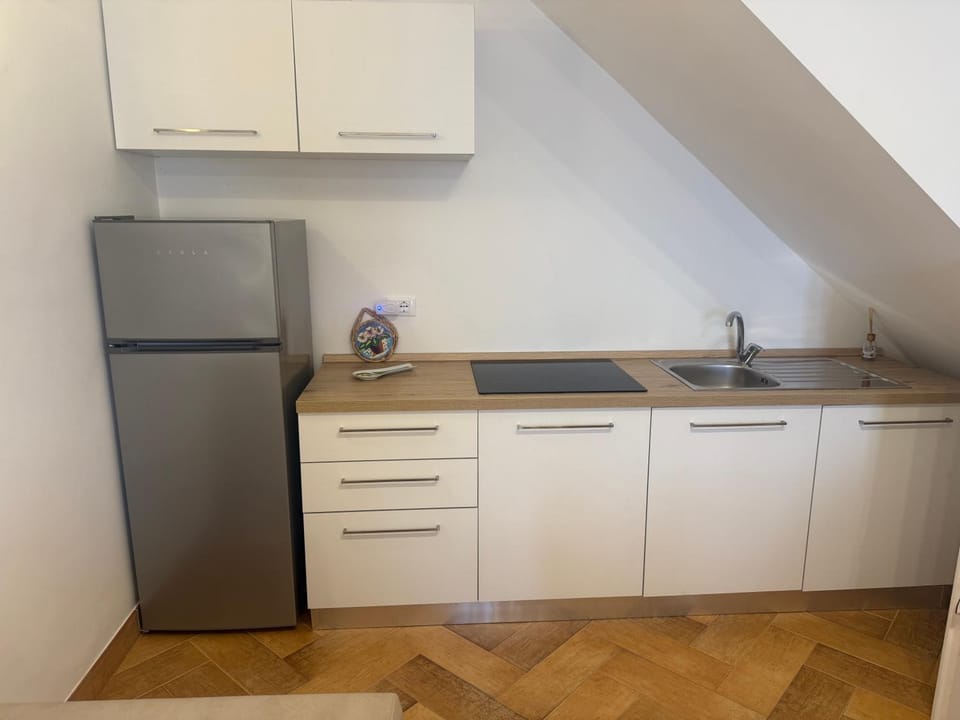 Kitchen or kitchenette, stove