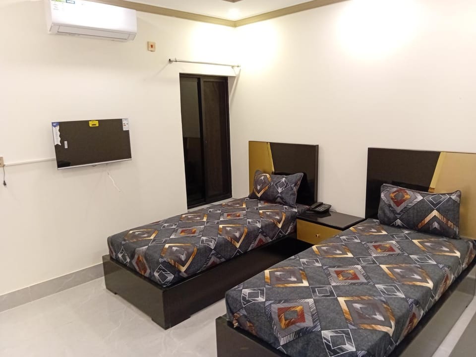 SI Family Hotel Johar Town Lahore Hotel in Lahore
